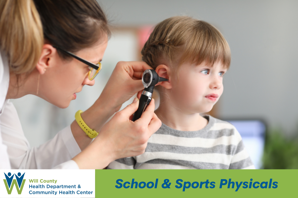 School and sports physical - photo of doctor looking into childs ear.